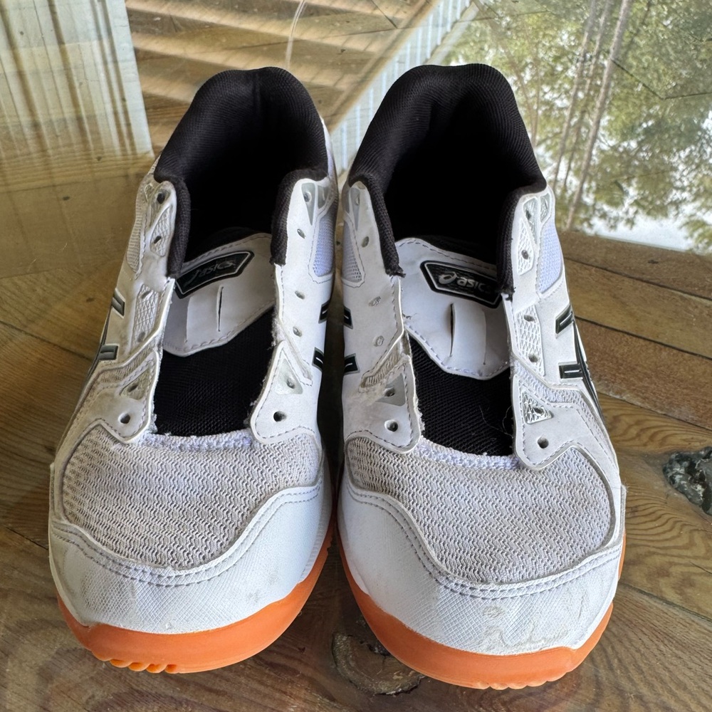 ASICS women’s gel rocket volleyball court Athletic Shoes in White/Orange